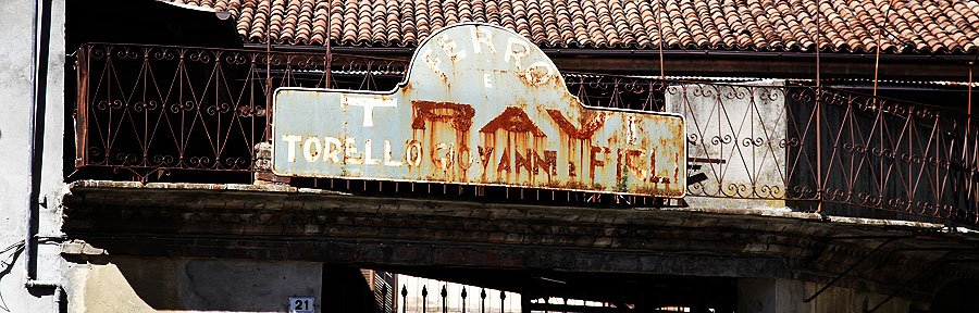 Beautiful old factory sign in Nizza Monferrato. 
